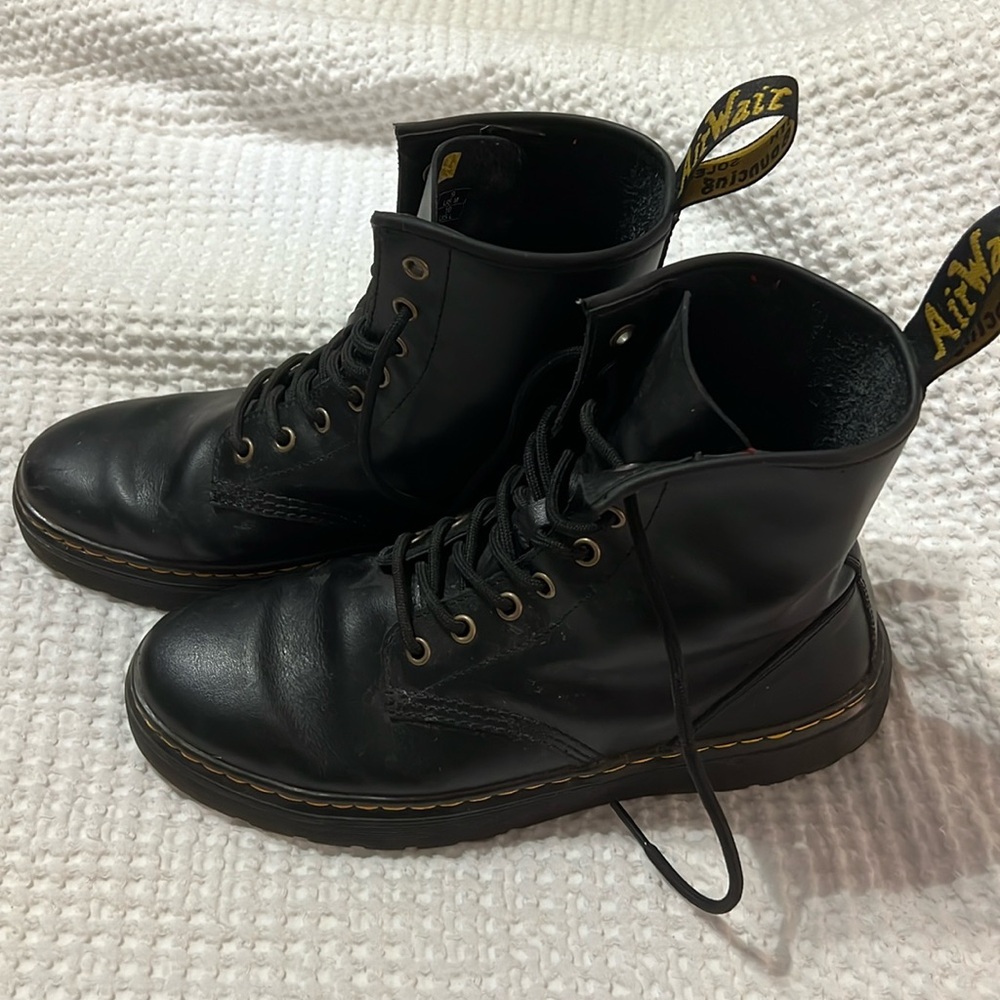 Black Doc Marten’s AirWair with bouncing soles.